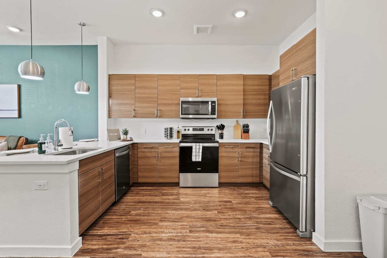 As you approach kitchen the elegant layout and well-stocked shelves make it the ideal spot to relax.