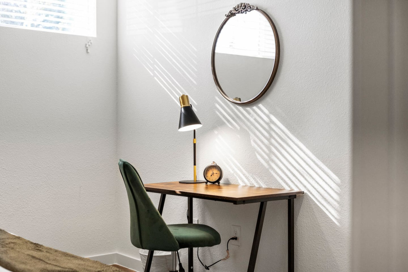 This cozy workspace with warm lighting, and a creative wall display, perfect for productivity.
