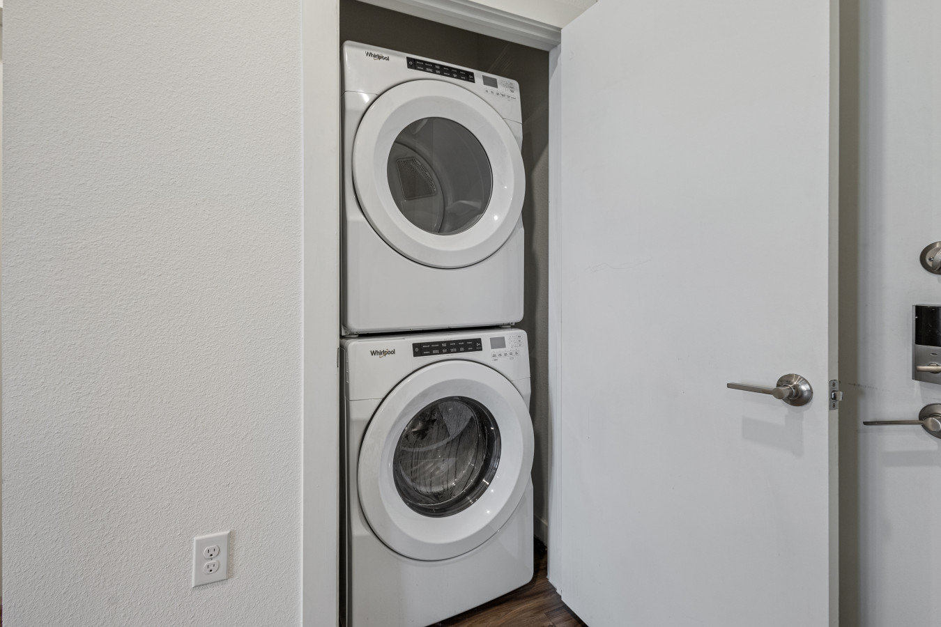 Enjoy the convenience of an in-unit Whirlpool washer and dryer tucked neatly in a laundry closet.