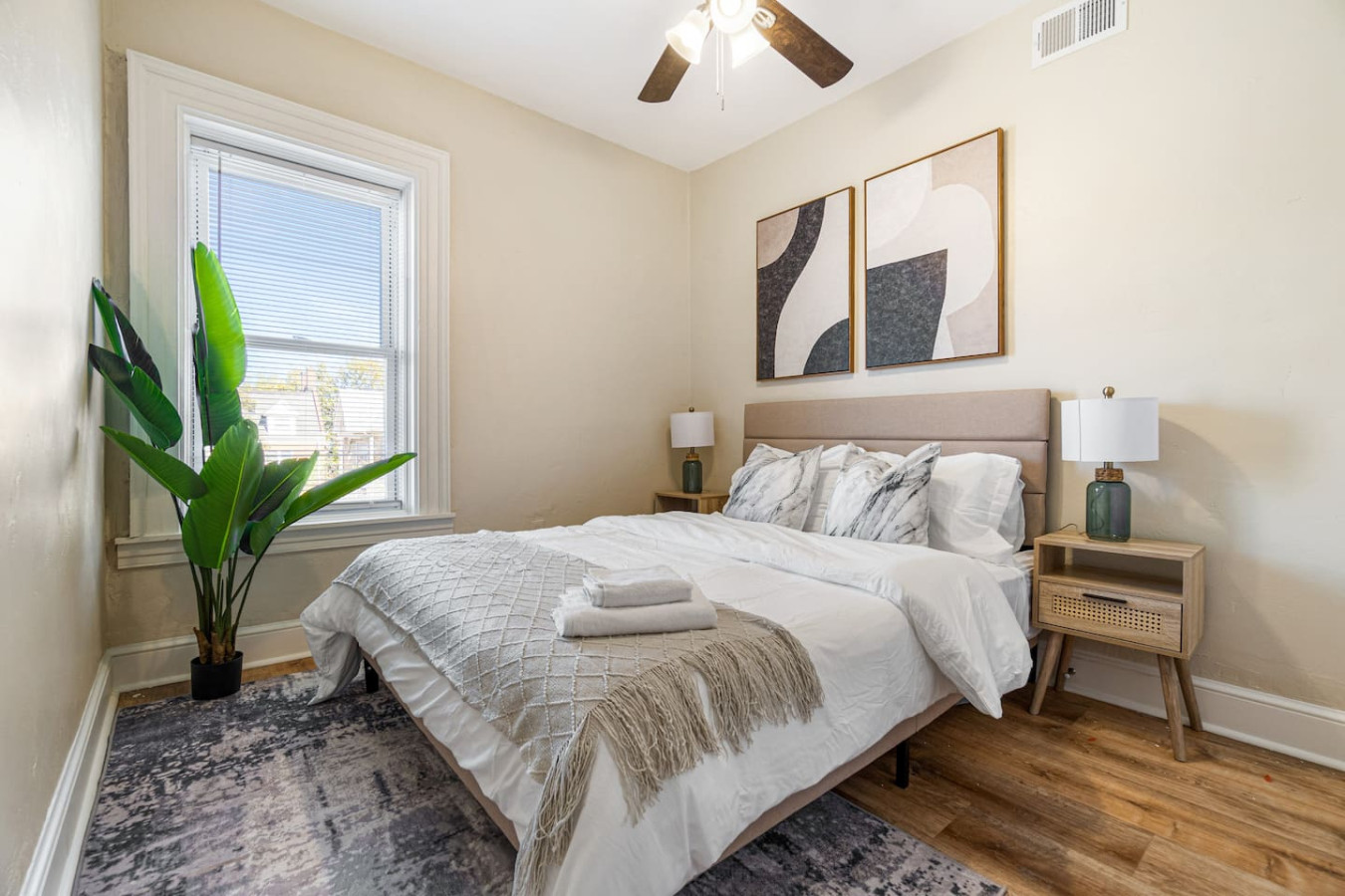 The bedroom offers a luxurious retreat, with a bed that promises restful nights and a room that feels like a private oasis.
