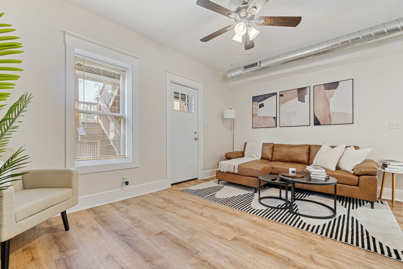 Spacious living room with stylish decor, perfect for unwinding after a day of exploring the local area.