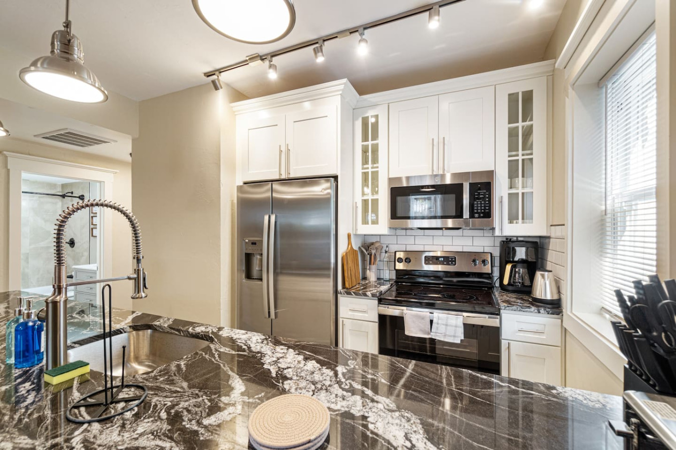 Well stocked kitchen, new stainless steel appliances