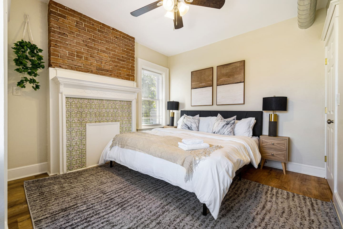 The bedroom offers a luxurious retreat, with a bed that promises restful nights and a room that feels like a private oasis.