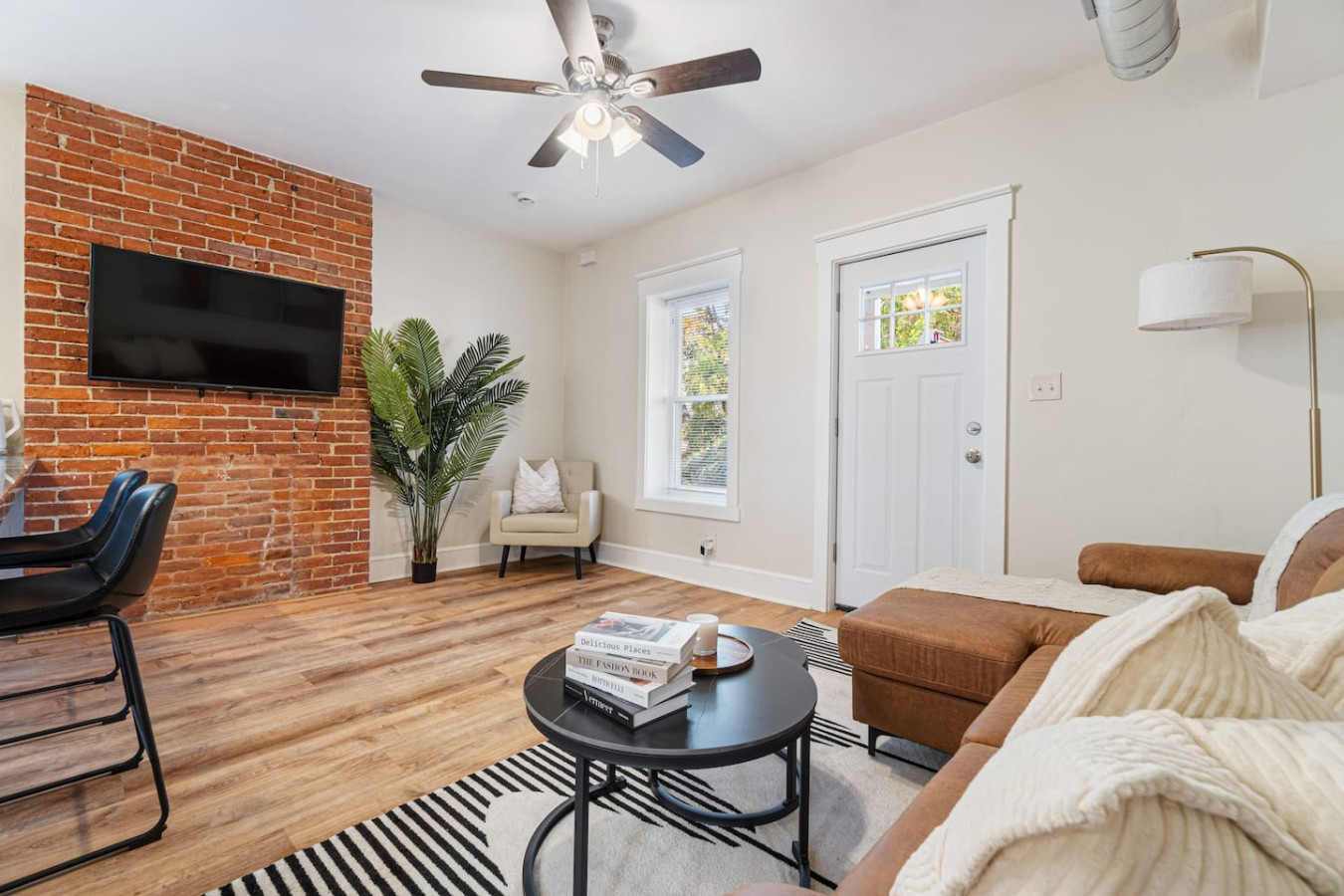Relax in the living room and watch your favorite shows, lounging is a great way to unwind after a long day.