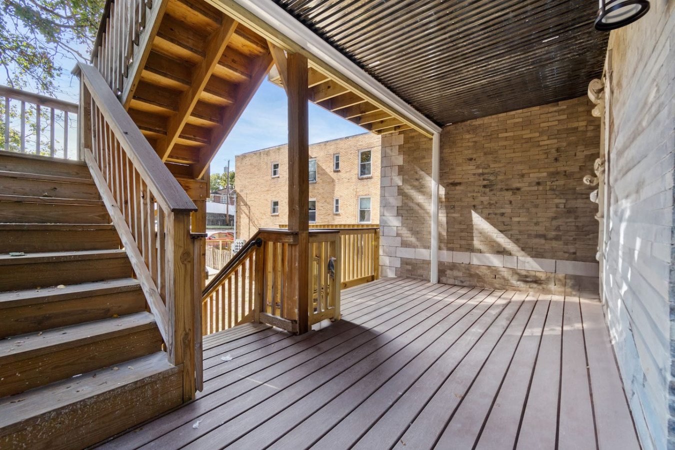 The staircase is a focal point of the home, with its graceful lines and stylish details adding to the overall charm.