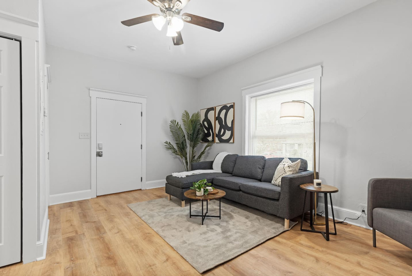 Spacious living room with stylish decor, perfect for unwinding after a day of exploring the local area.
