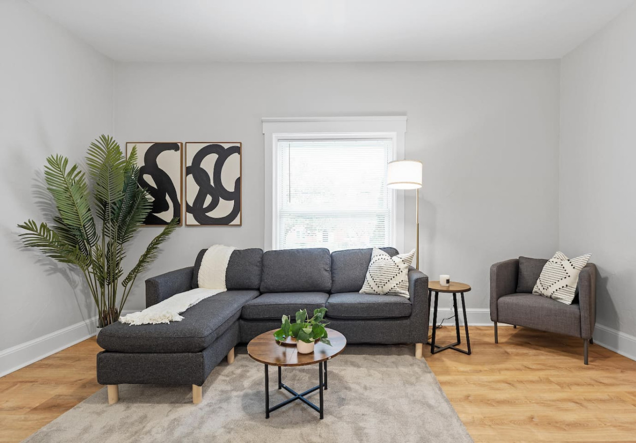 Spacious living room with stylish decor, perfect for unwinding after a day of exploring the local area.