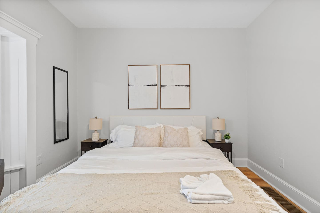 The king bedroom offers a luxurious retreat, with a bed that promises restful nights and a room that feels like a private oasis.