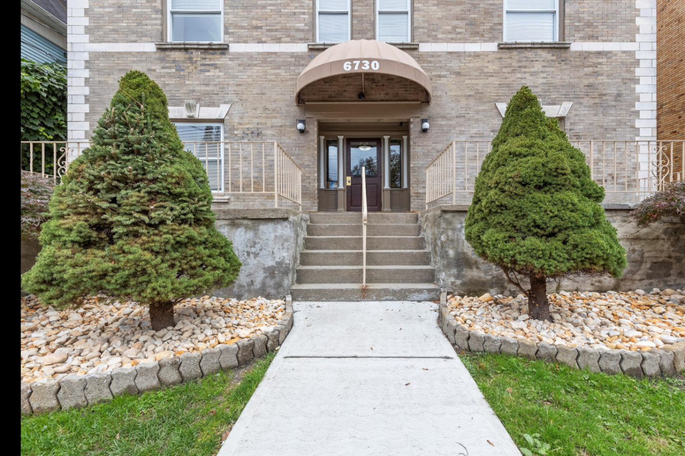 Welcoming facade of the home, showcasing beautiful architecture and a well-maintained exterior, perfect for a relaxing stay.