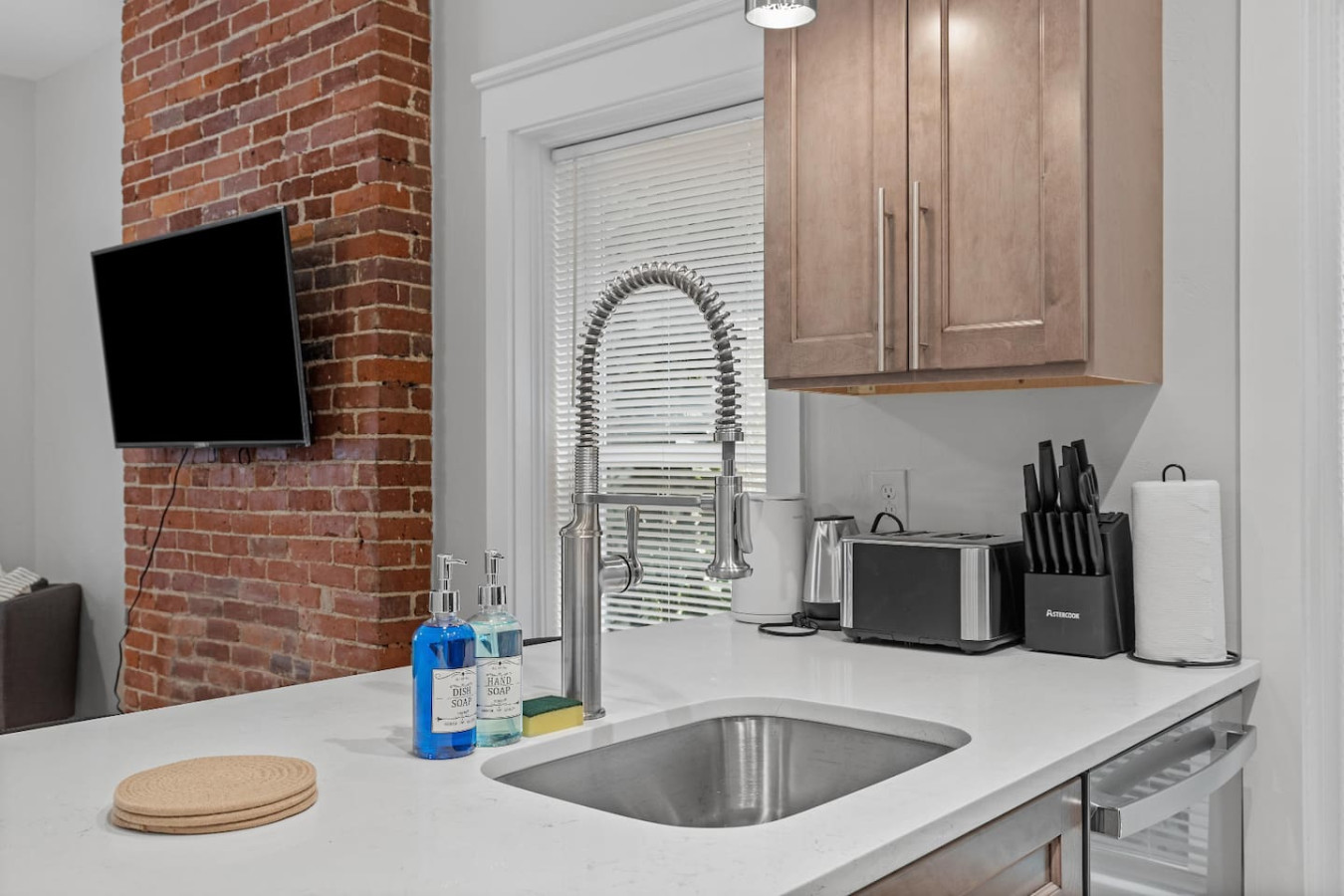 As you step into the kitchen, the clean lines and functional design make you eager to start cooking your favorite dishes.