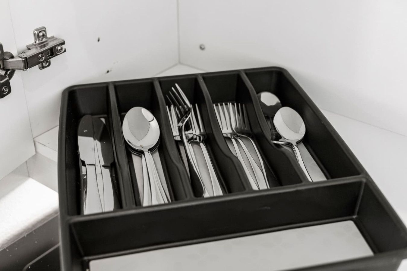 Kitchen utensils with scissors, measuring cups, grater, wine opener, can opener