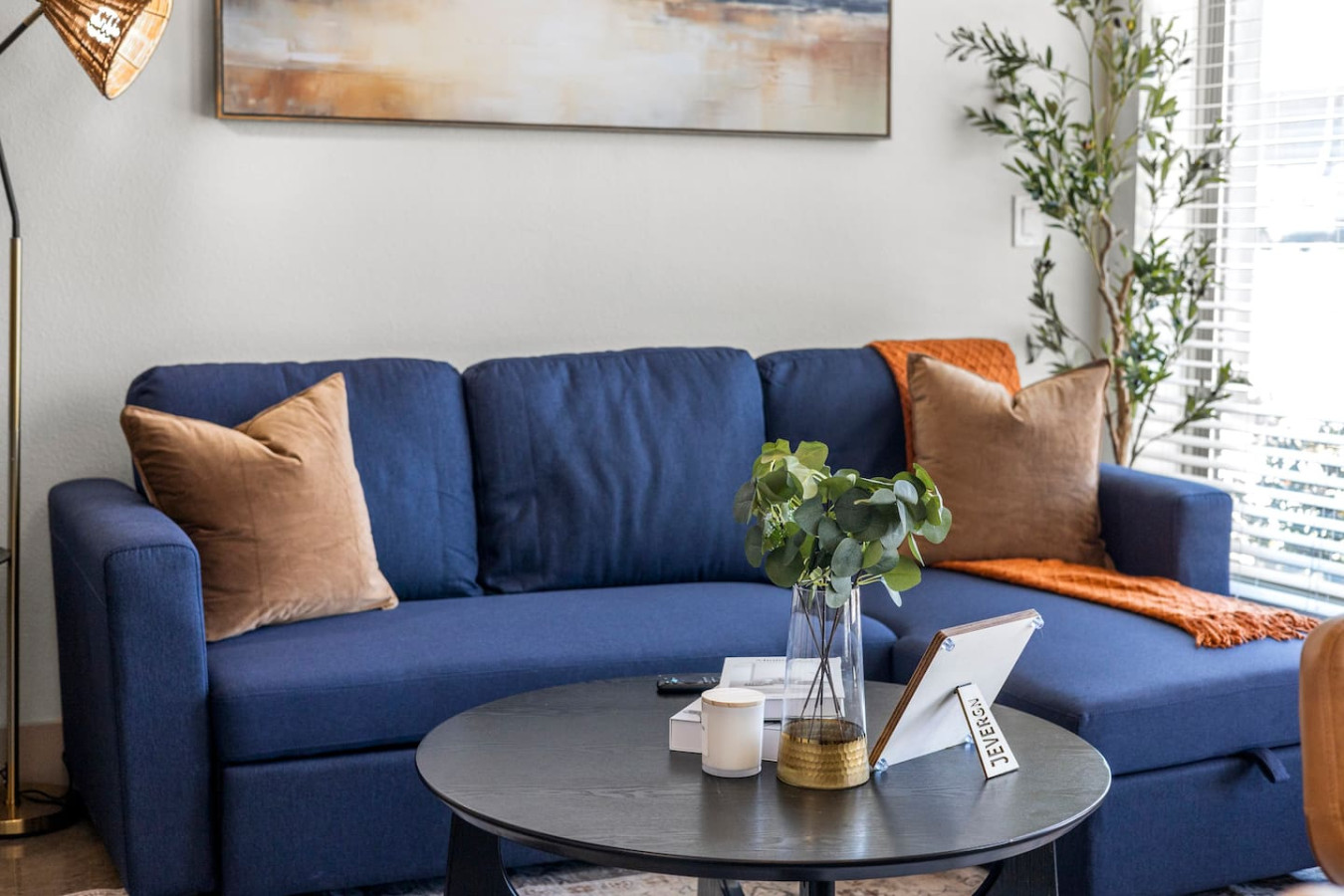 As you take a seat in the living room, the comfortable furniture and tasteful design make it easy to unwind.