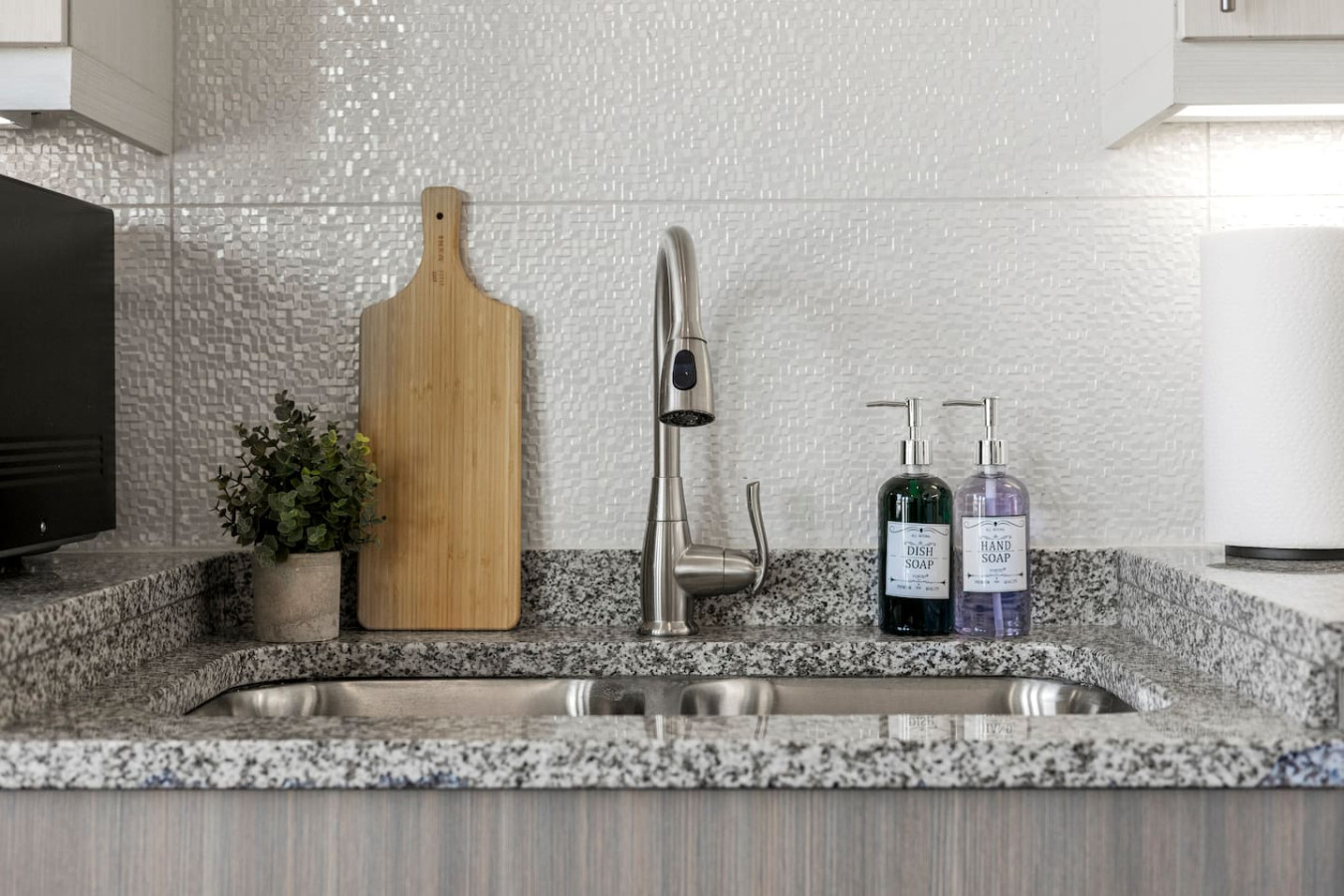 As you step into the kitchen, the clean lines and functional design make you eager to start cooking your favorite dishes.