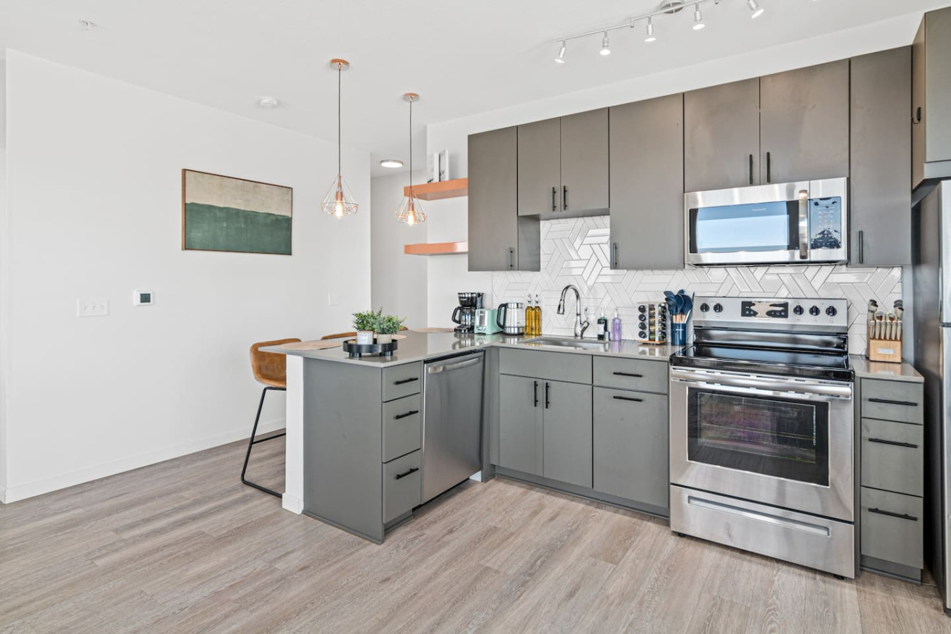 The kitchen invites you to experiment with new recipes, offering a stylish and practical space to cook and create.