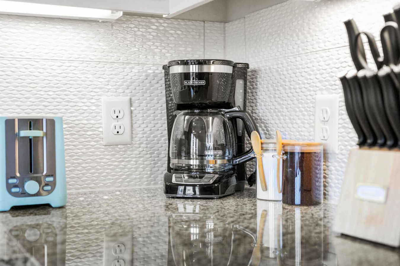 Fully equipped kitchen with all the tools you need for a perfect culinary experience. Enjoy the convenience of having everything at your fingertips!