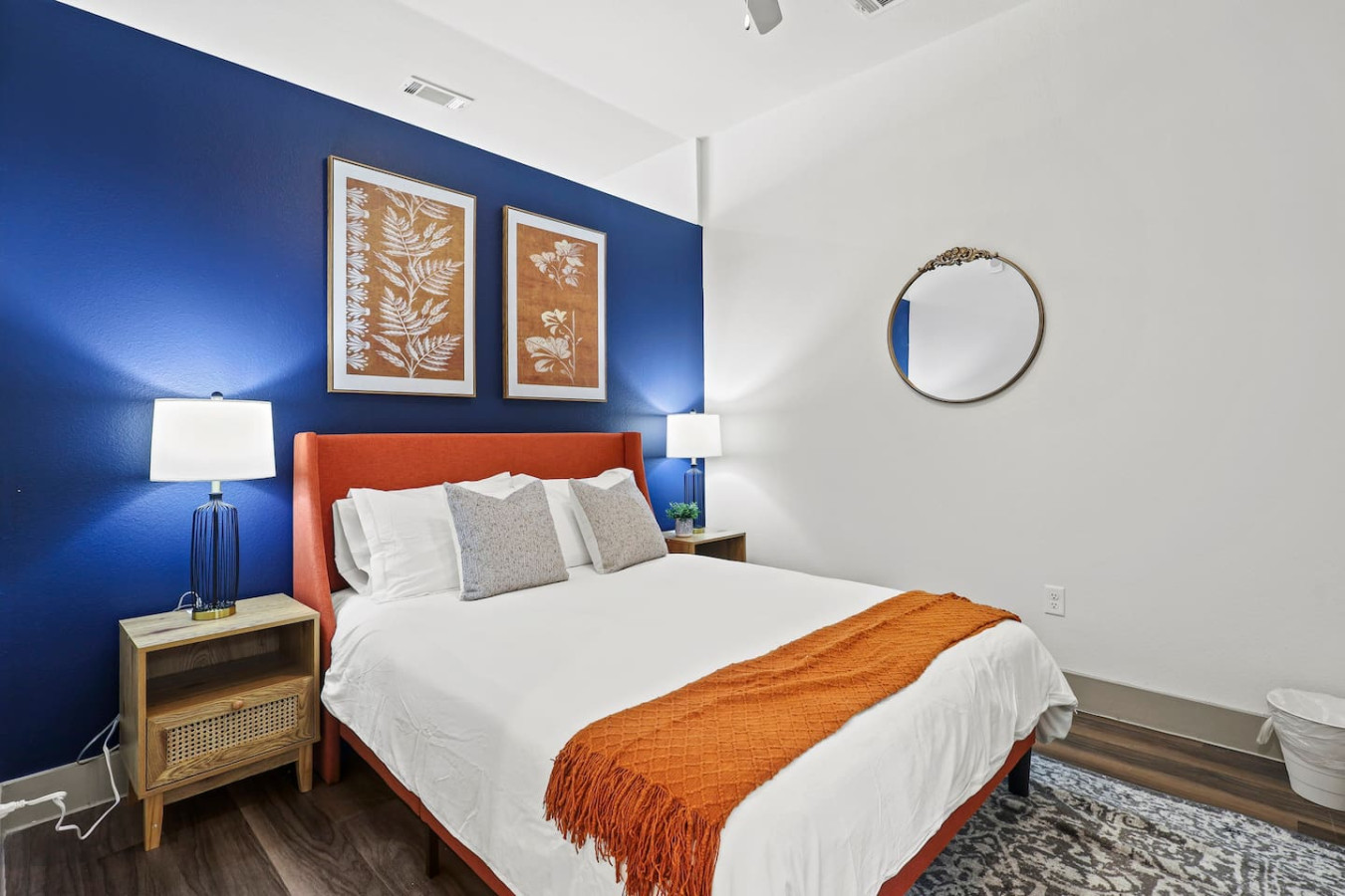 Luxurious queen bedroom featuring a comfortable bed, elegant decor, and plenty of natural light for a rejuvenating sleep.