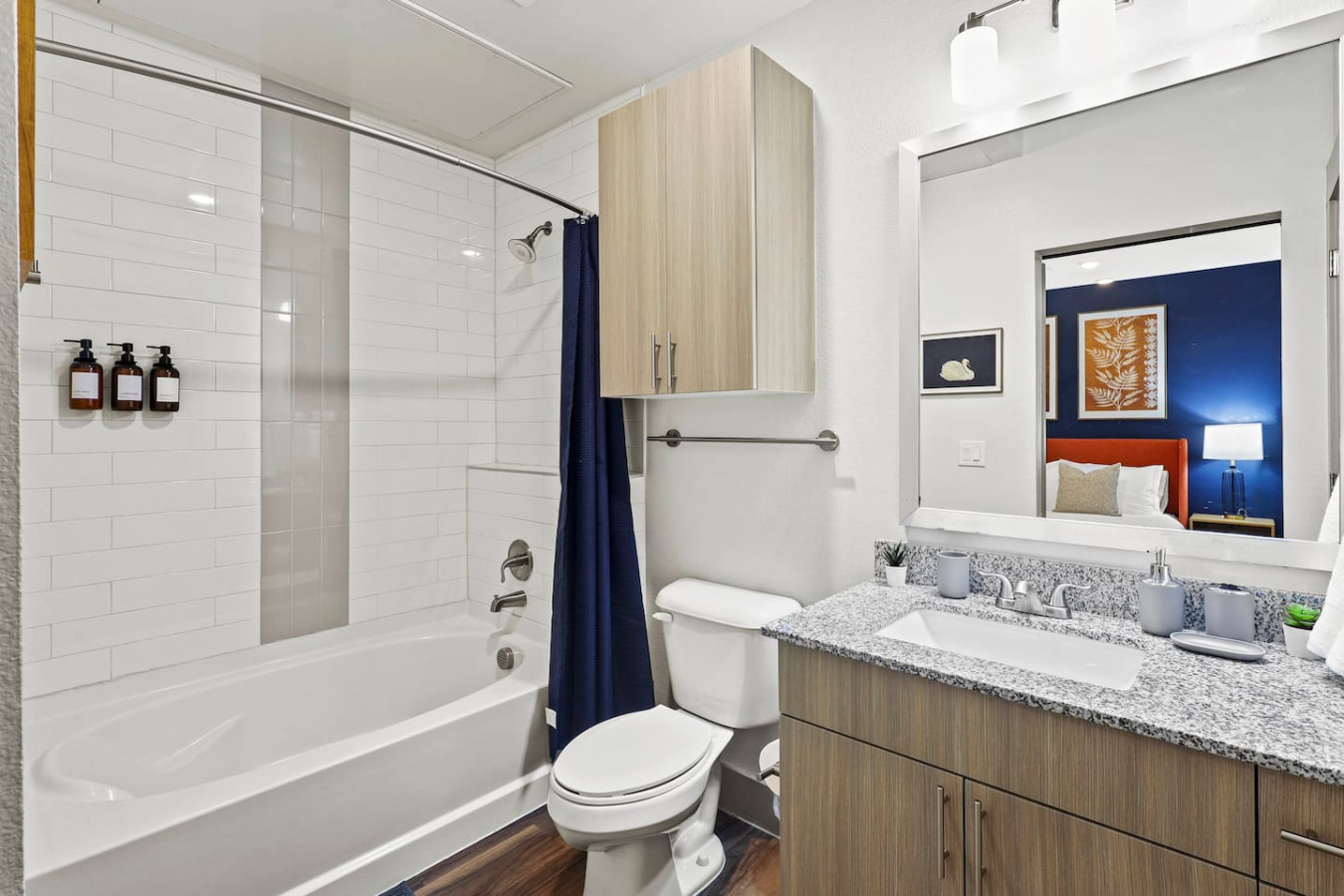 You feel a sense of calm as you enter the bathroom, where the thoughtful design and high-quality materials create a serene environment.