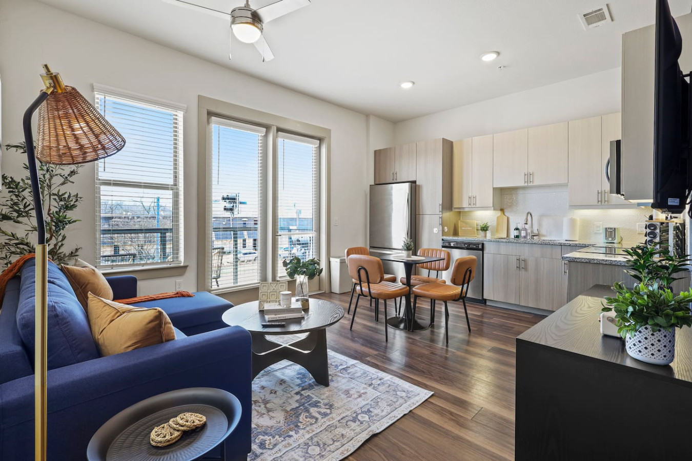 You feel at home as you settle into the living room, where the inviting atmosphere is perfect for lounging or entertaining.