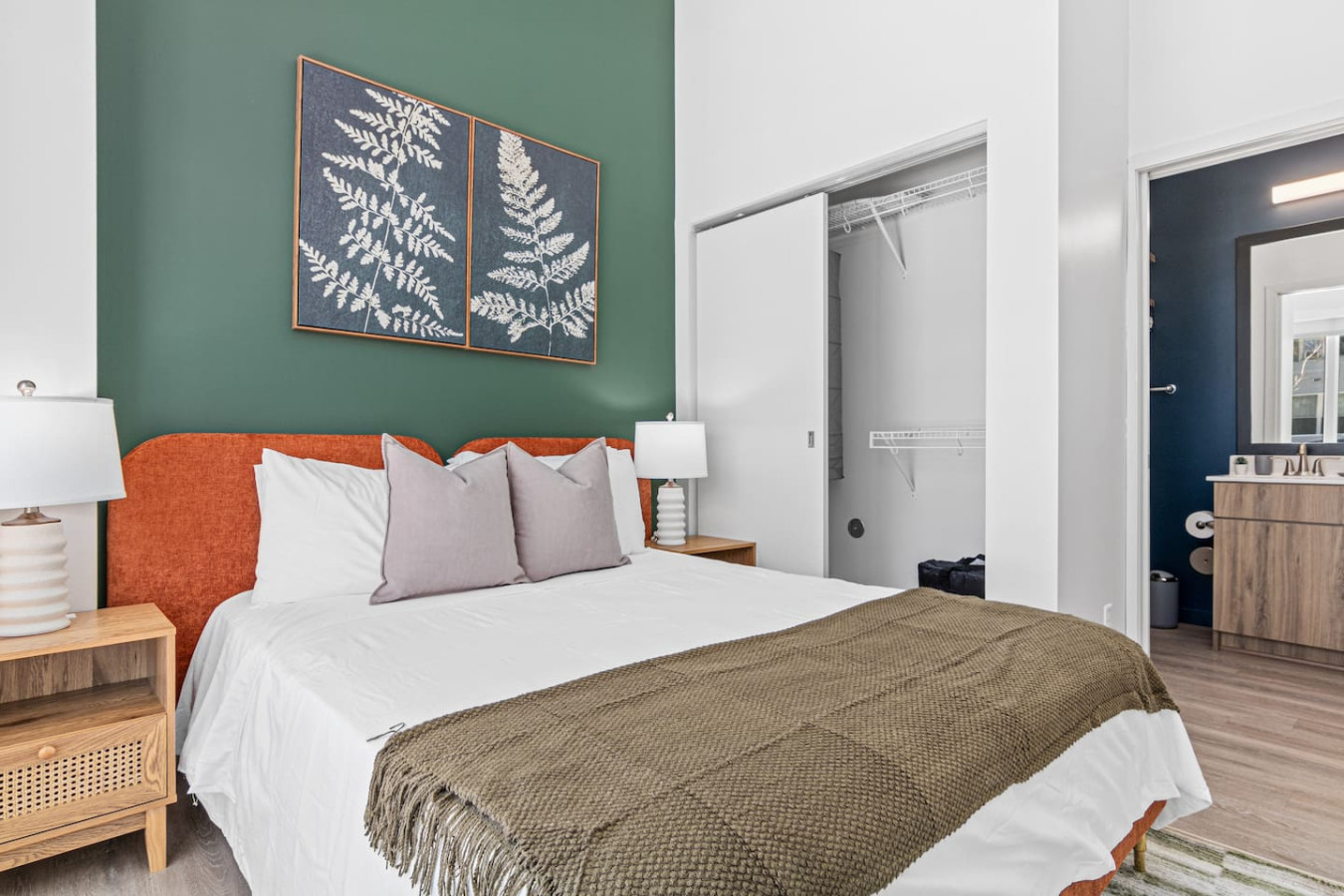 The bedroom’s serene ambiance invites you to relax, with a plush bed that promises a restful night's sleep.