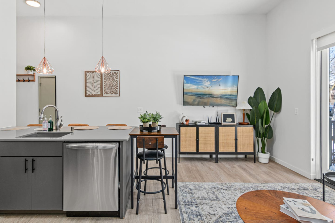 An open-concept area featuring a modern furnishings, and a stylish entertainment setup—ideal for gatherings and relaxation.