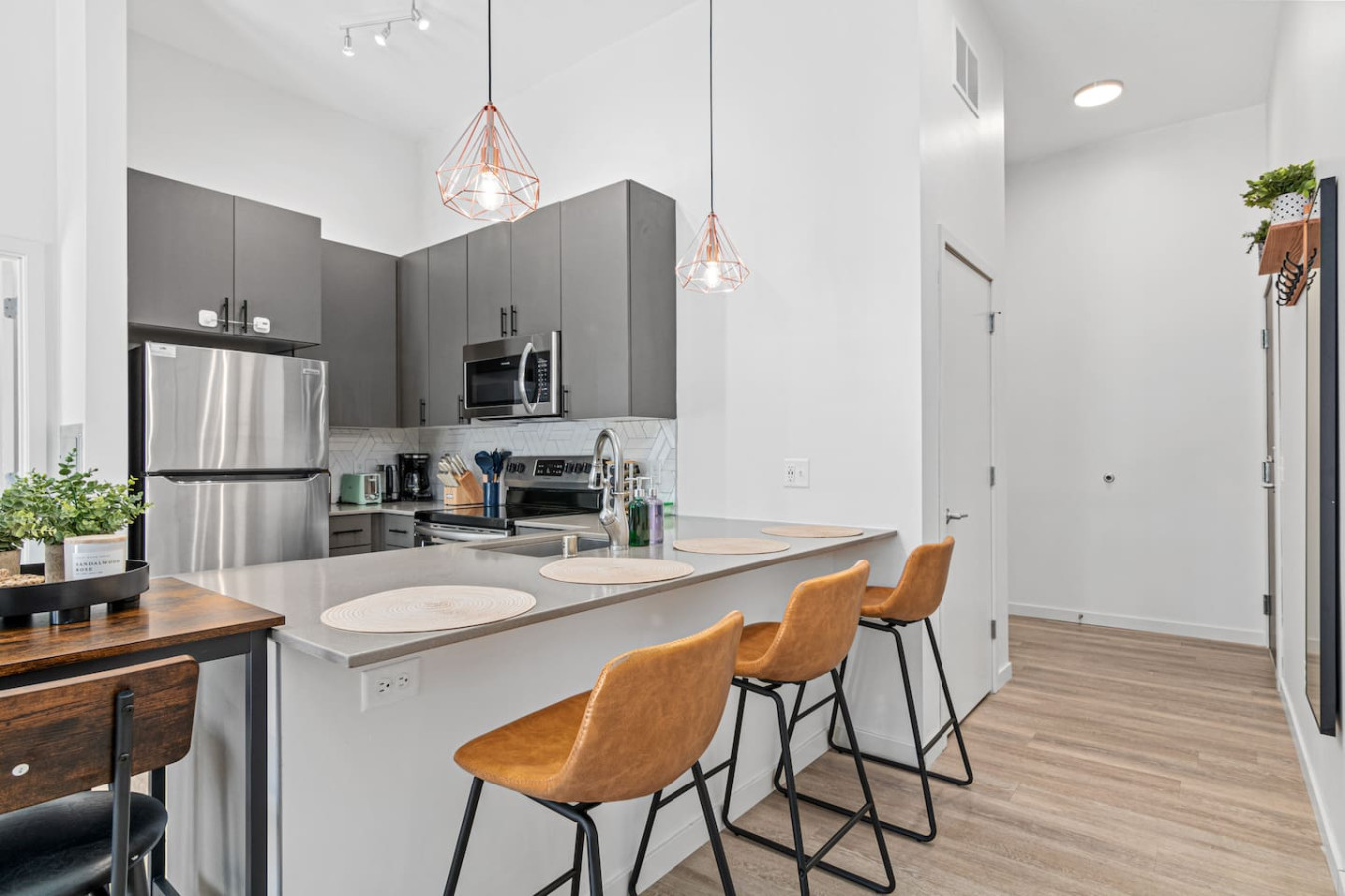 The dining room encourages you to gather with friends, enjoy a drink, and create lasting memories.