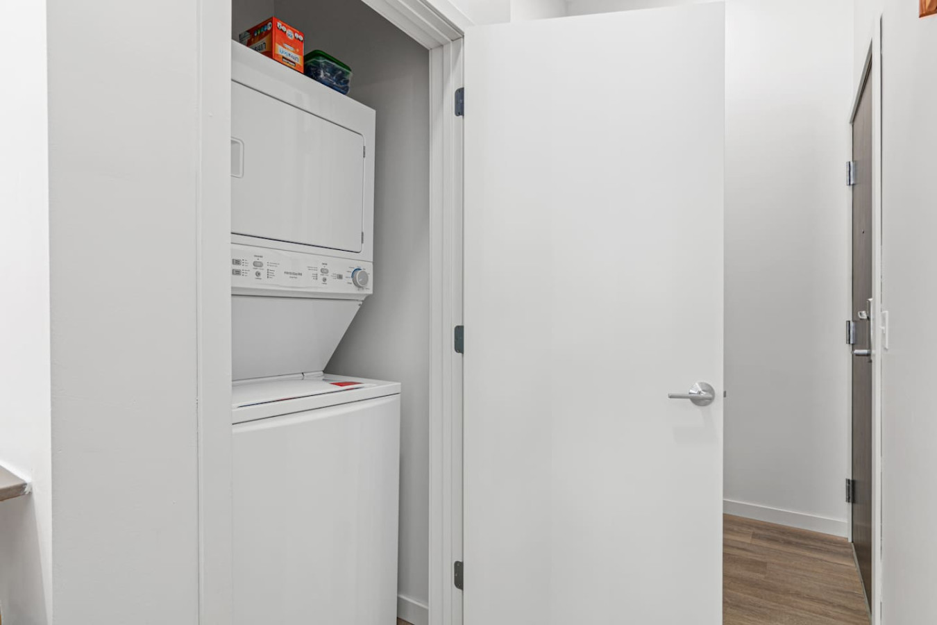 Convenient laundry room with washer, dryer, and all necessary supplies, making it easy to take care of your laundry needs.