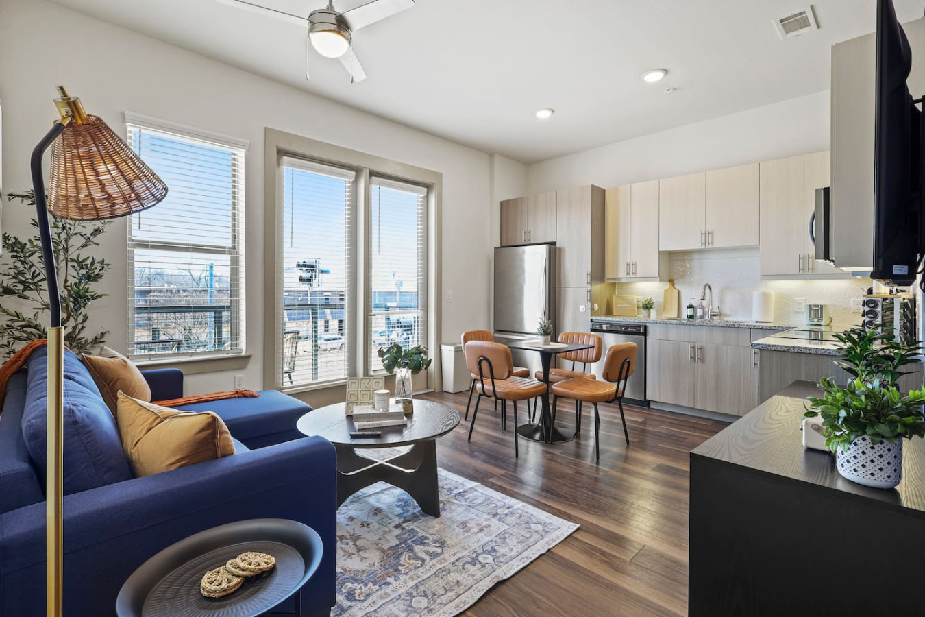 An open-concept area featuring a modern furnishings, and a stylish entertainment setup—ideal for gatherings and relaxation.