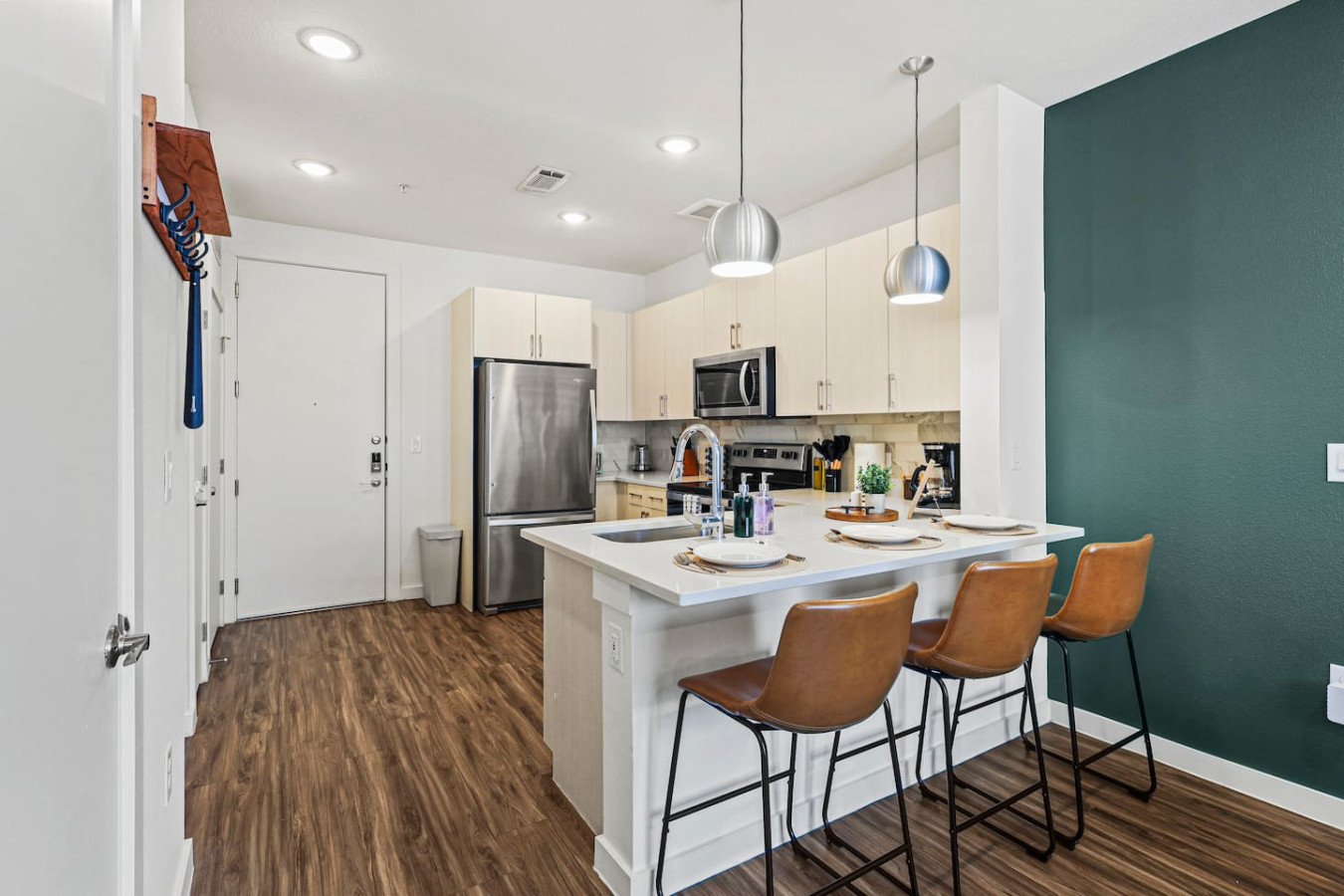 As you take your seat, the dining room's sophisticated design sets the stage for memorable meals and conversations.