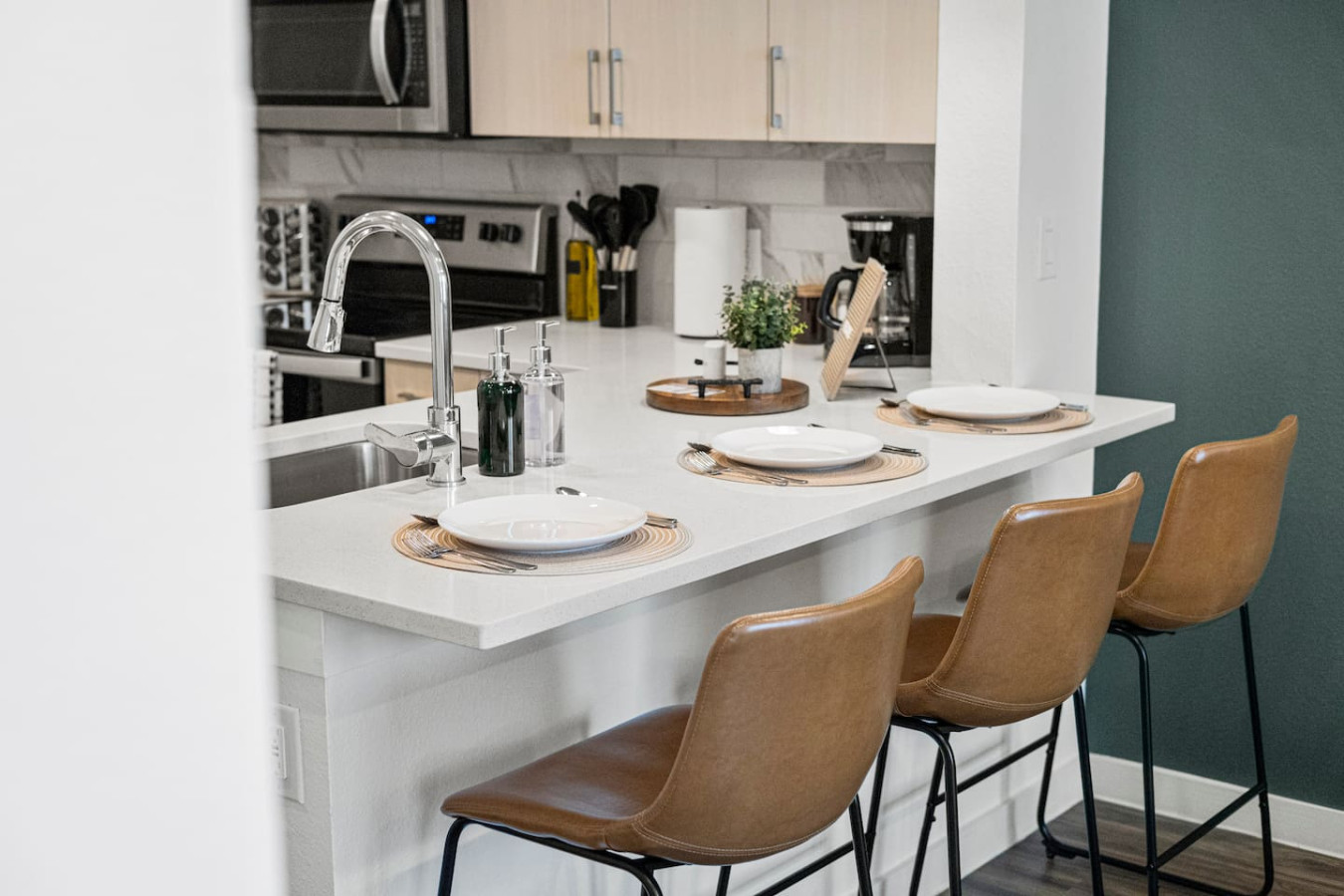 As you take your seat, the dining room's sophisticated design sets the stage for memorable meals and conversations.