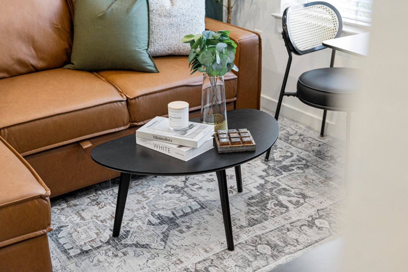 As you take a seat in the living room, the comfortable furniture and tasteful design make it easy to unwind.