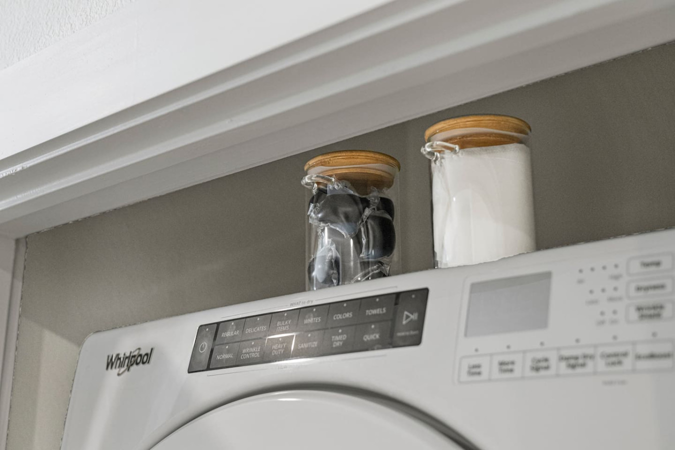 Convenient laundry room with washer, dryer, and all necessary supplies, making it easy to take care of your laundry needs.