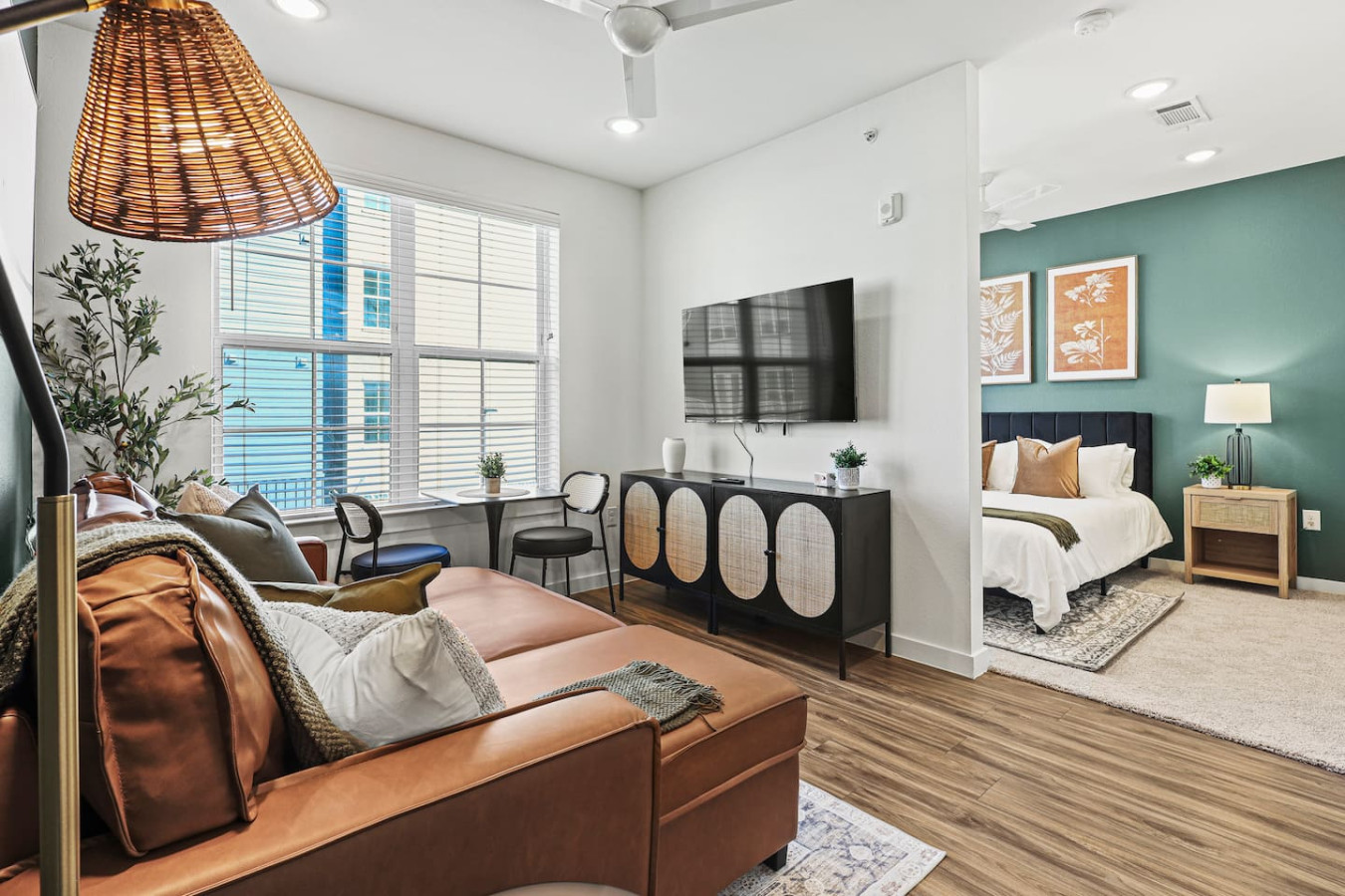 The living room is filled with natural light, creating a bright and welcoming space that invites relaxation.