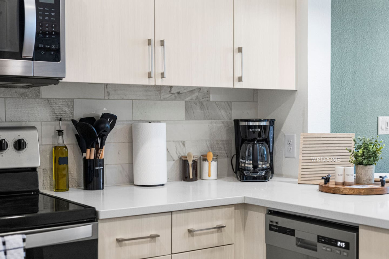 As you open the kitchen, you discover an assortment of coffee pods, and sugar, ensuring you have everything you need for a perfect morning or afternoon pick-me-up.