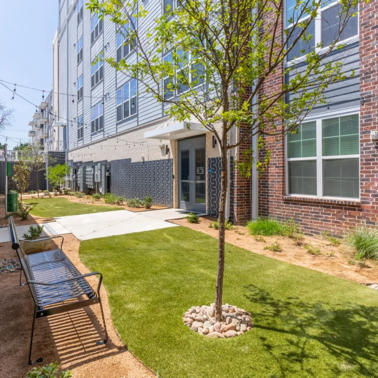 The house’s exterior is a blend of modern and classic design elements, creating a welcoming and stylish facade.