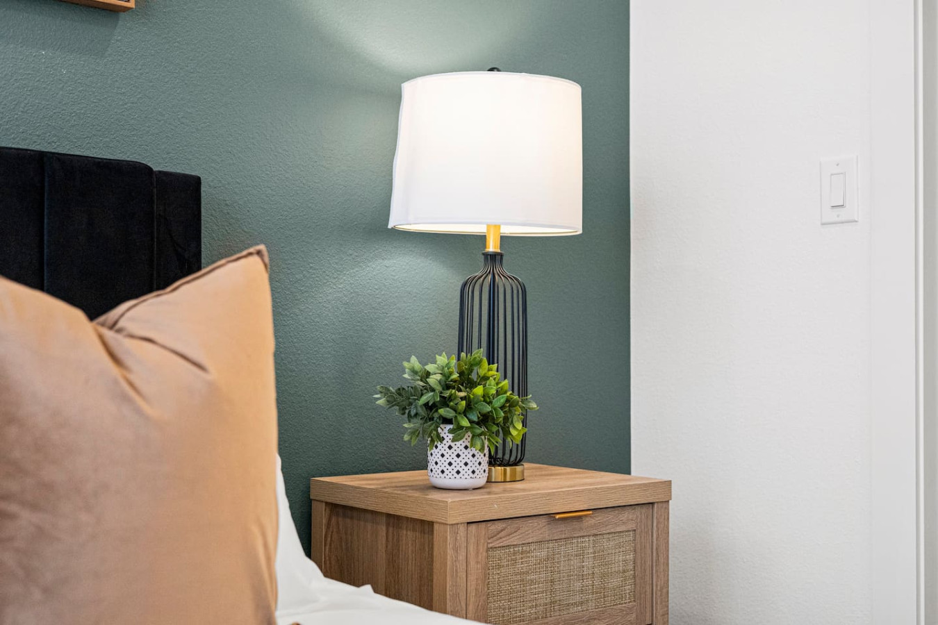 The queen bedroom’s stylish design and comfortable bedding create a perfect sanctuary for restful nights.