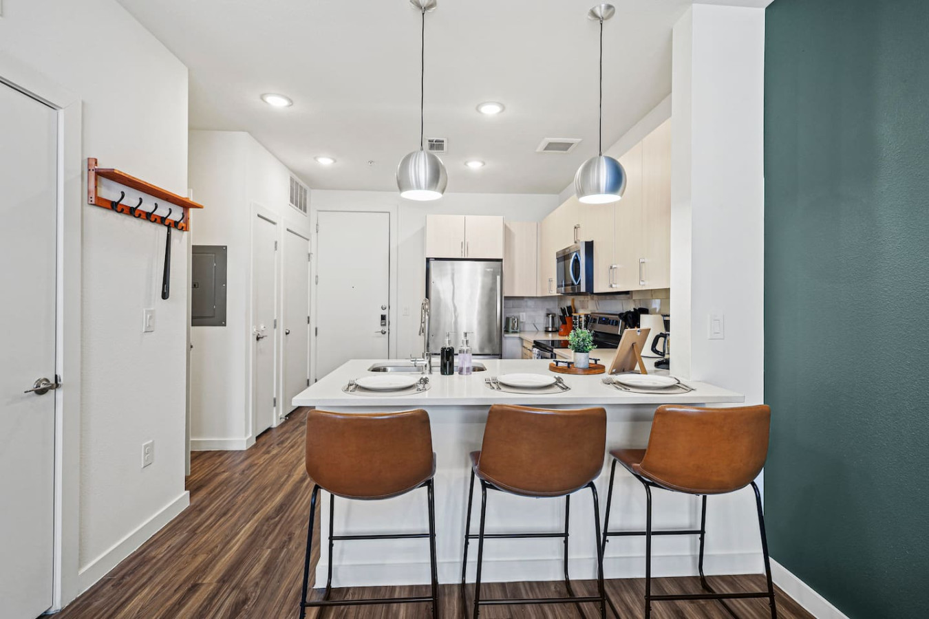 As you take your seat, the dining room's sophisticated design sets the stage for memorable meals and conversations.