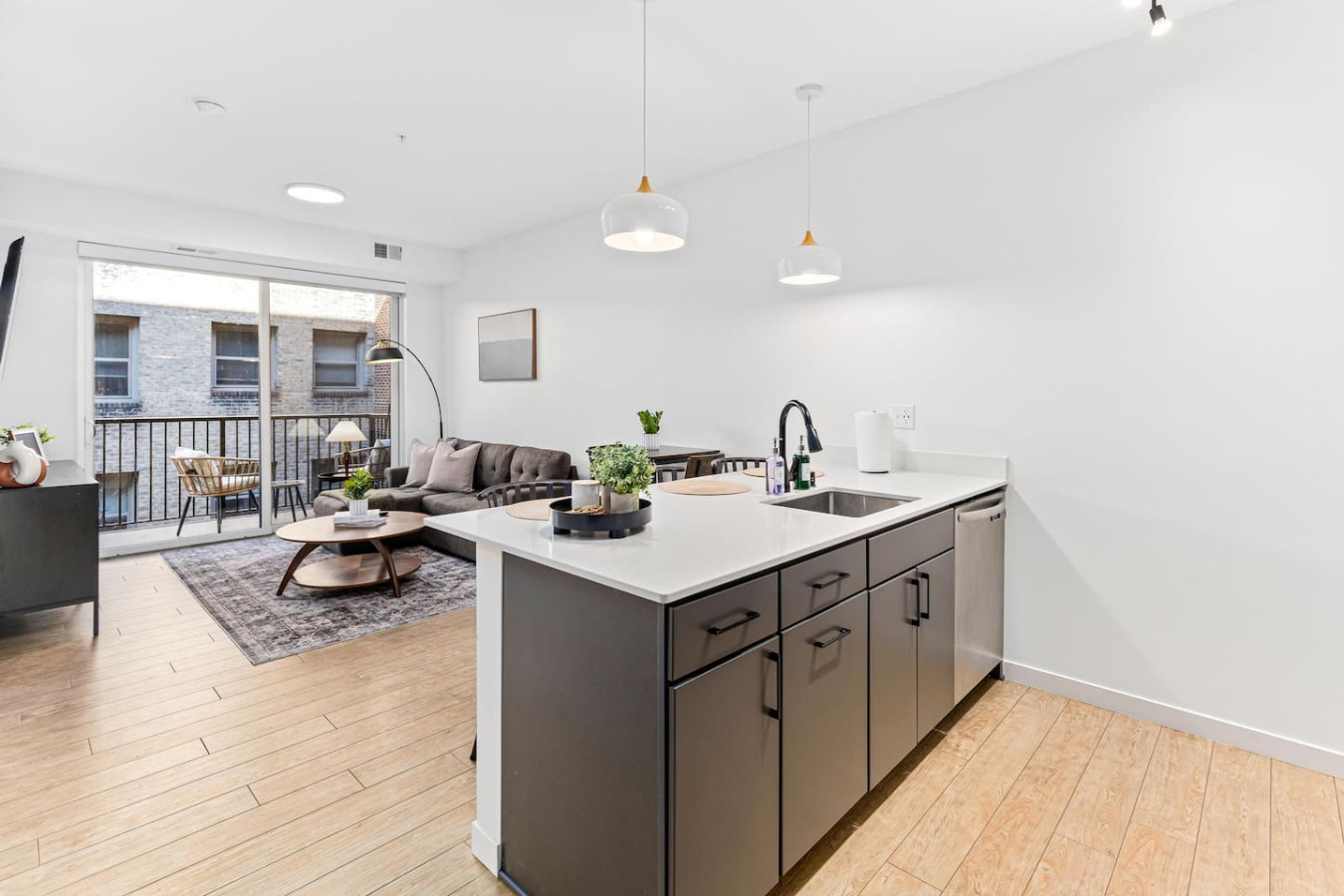 As you approach the home bar, the elegant layout and well-stocked shelves make it the ideal spot to relax.