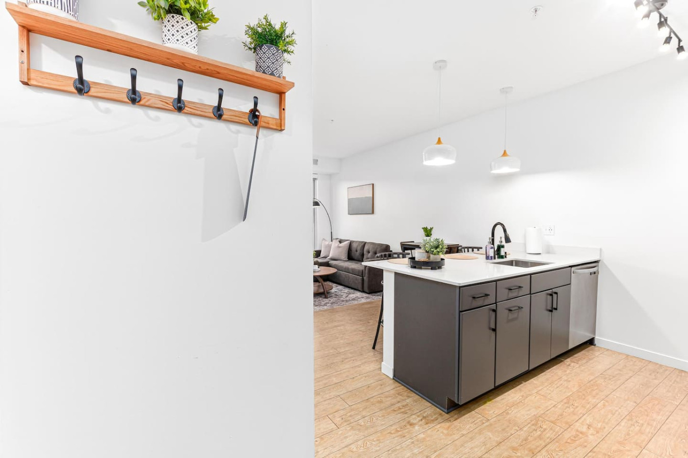 As you approach the home bar, the elegant layout and well-stocked shelves make it the ideal spot to relax.