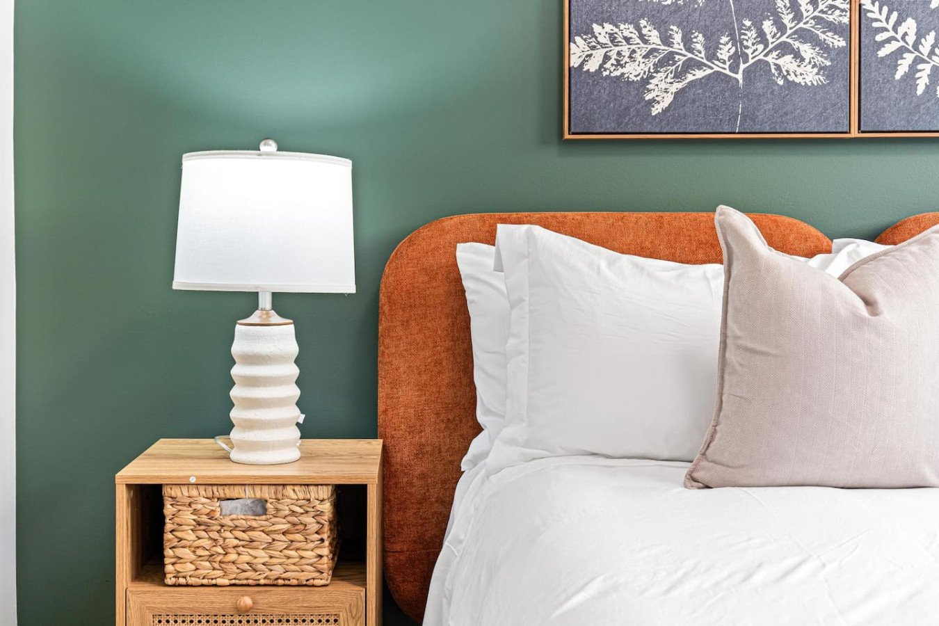 You feel enveloped in comfort as you relax on the queen bed, surrounded by a room designed for tranquility.