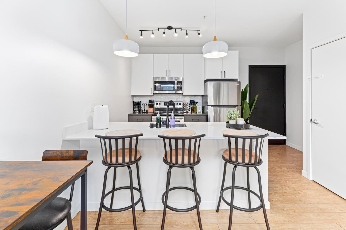 The dining area encourages you to gather with friends, enjoy a drink, and create lasting memories.