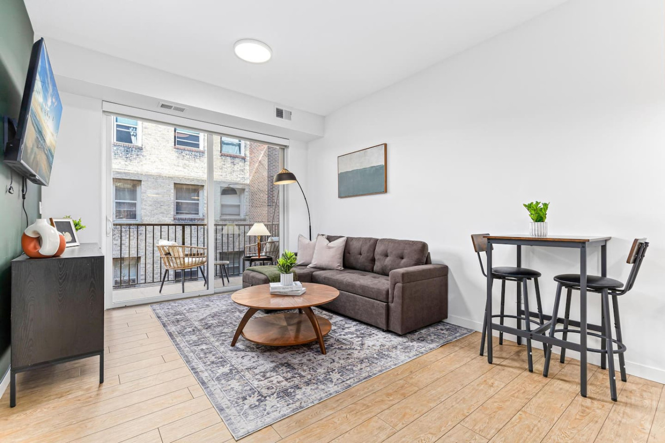 Spacious living room with stylish decor, perfect for unwinding after a day of exploring the local area.