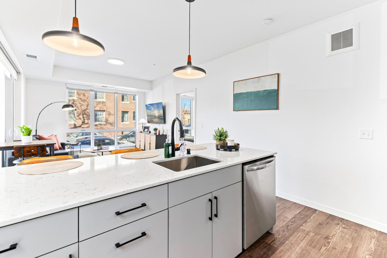 The kitchen’s open layout allows you to move freely as you prepare meals, with everything you need at your fingertips.