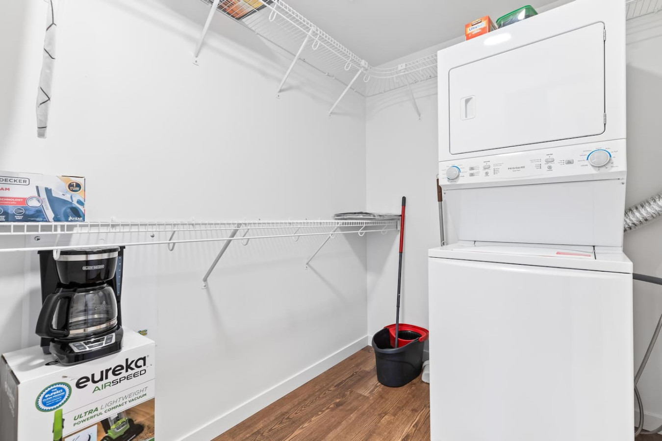 Convenient laundry room with washer, dryer, and all necessary supplies, making it easy to take care of your laundry needs.