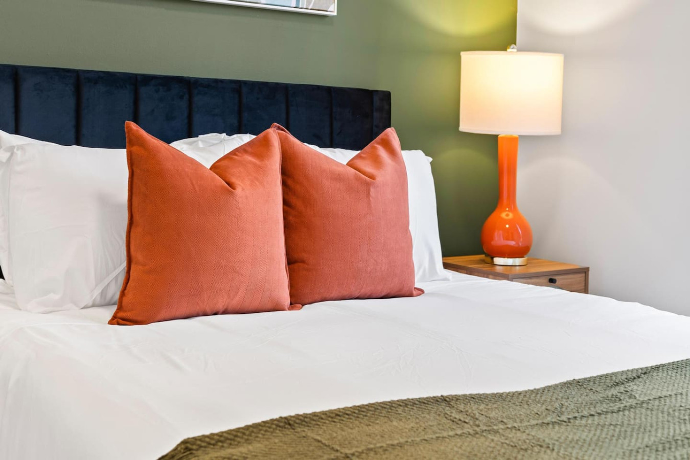Luxurious bedroom featuring a comfortable bed, elegant decor, and plenty of natural light for a rejuvenating sleep.