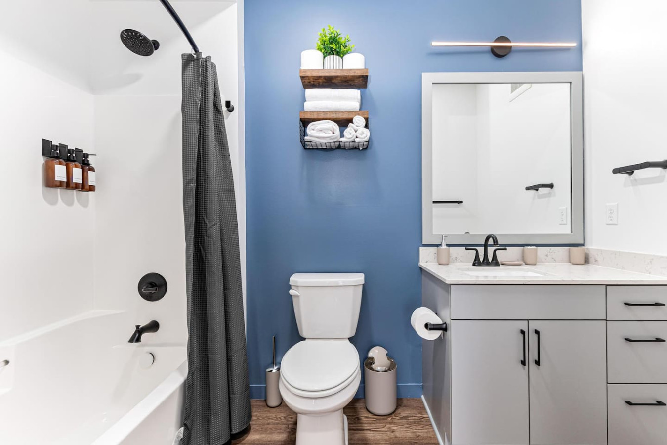 You feel a sense of calm as you enter the bathroom, where the thoughtful design and high-quality materials create a serene environment.