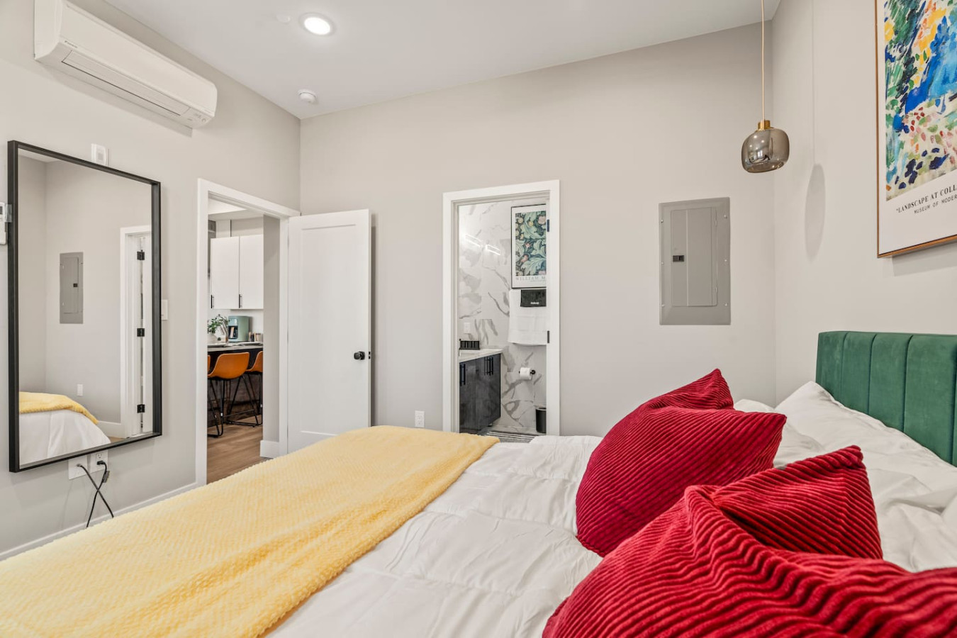 You feel a sense of serenity as you step into the king bedroom, where the elegant design and comfortable bed invite relaxation.
