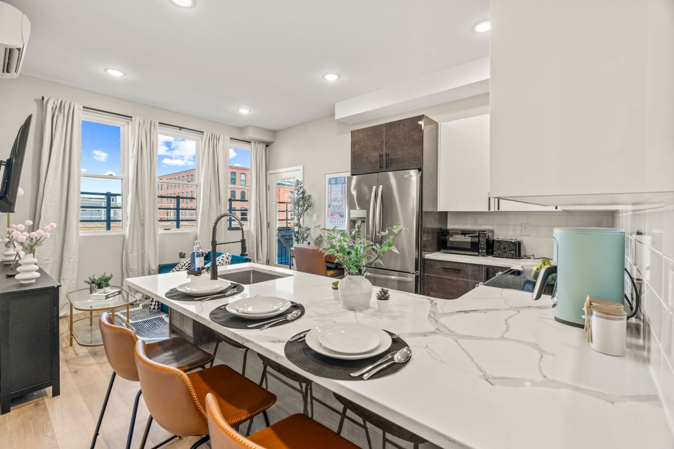 You are surrounded by tasteful decor and warm tones, making the dining room a perfect setting for any occasion.