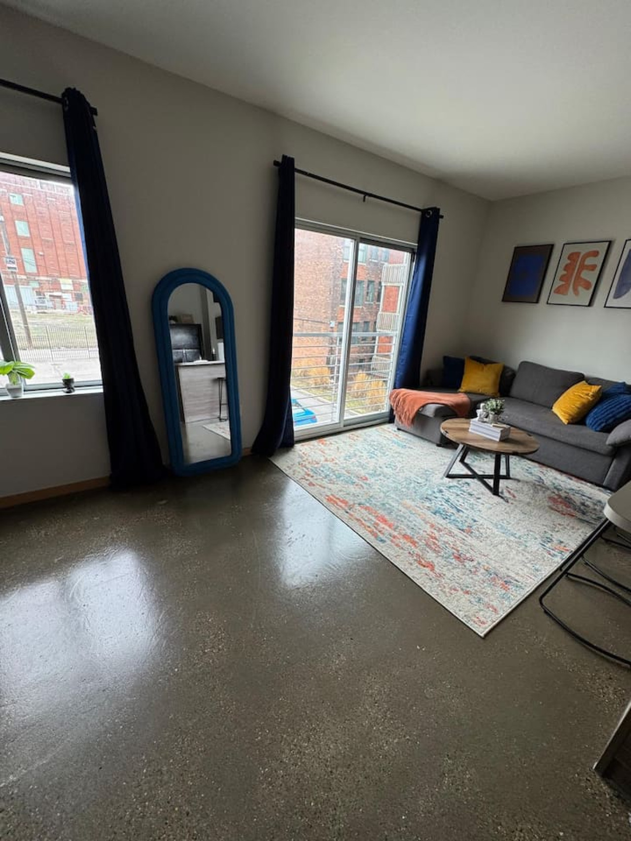 Spacious living room with stylish decor, perfect for unwinding after a day of exploring the local area.