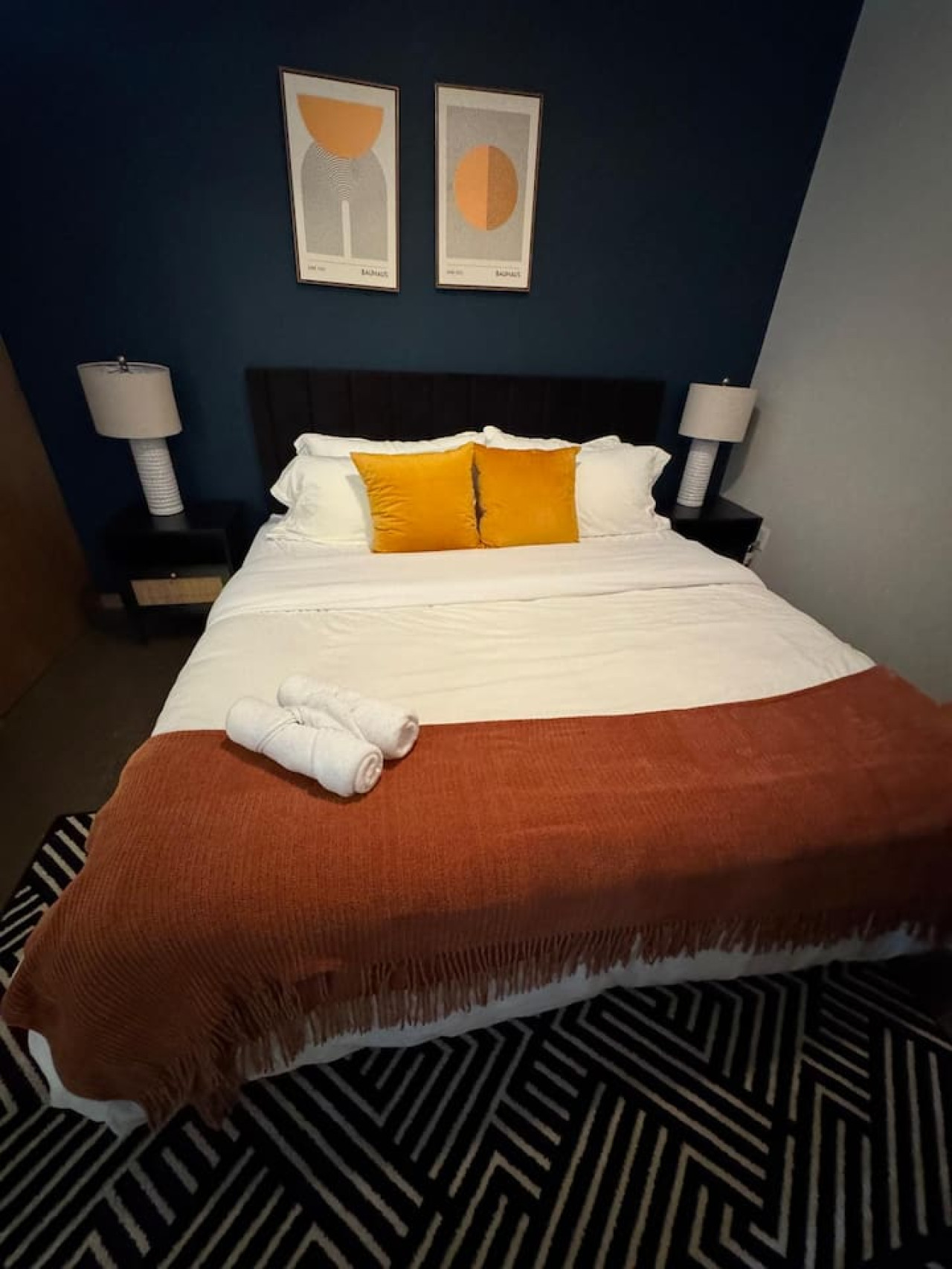 As you lie back on the queen bed, you are surrounded by elegant decor and a soothing color palette that calms the senses.