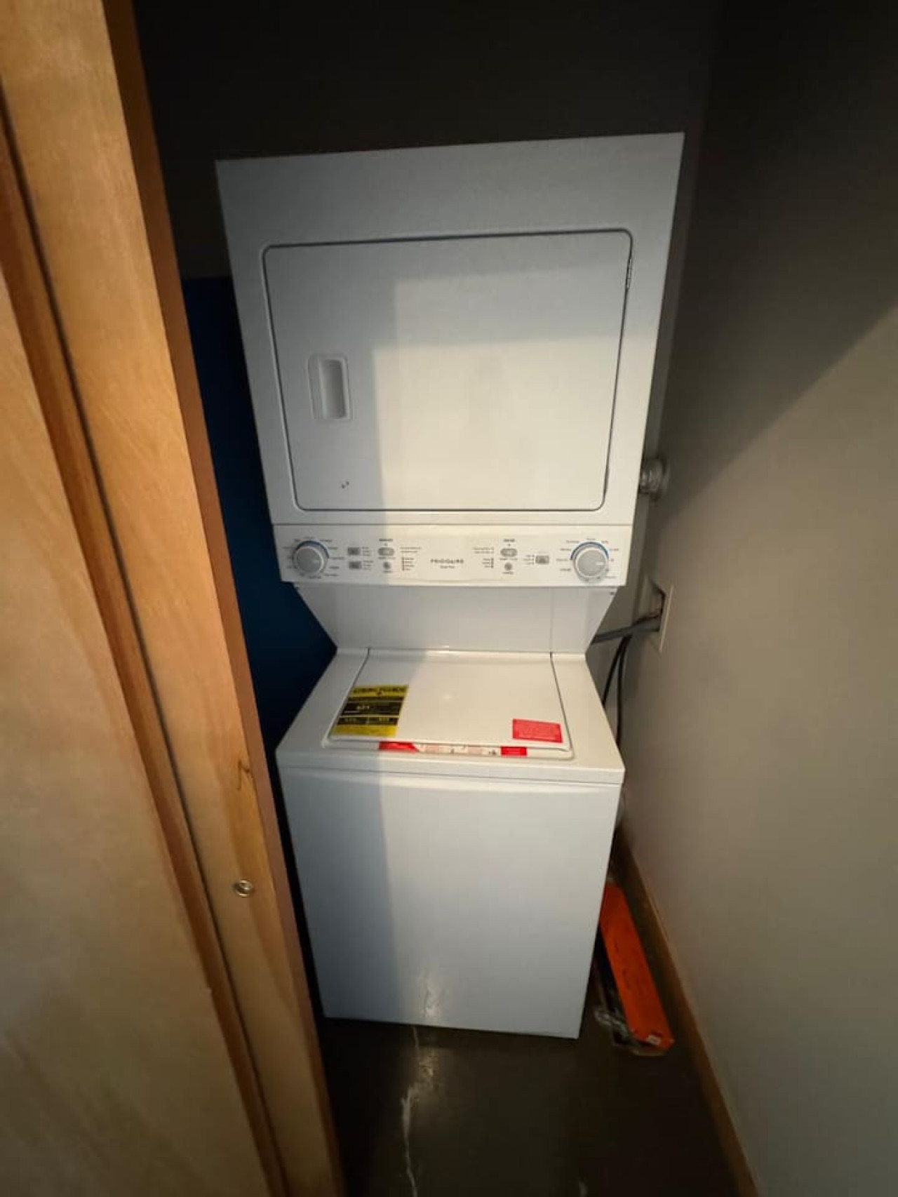 Laundry room with a washer, dryer, and folding area, offering all the convenience you need for a comfortable extended stay.
